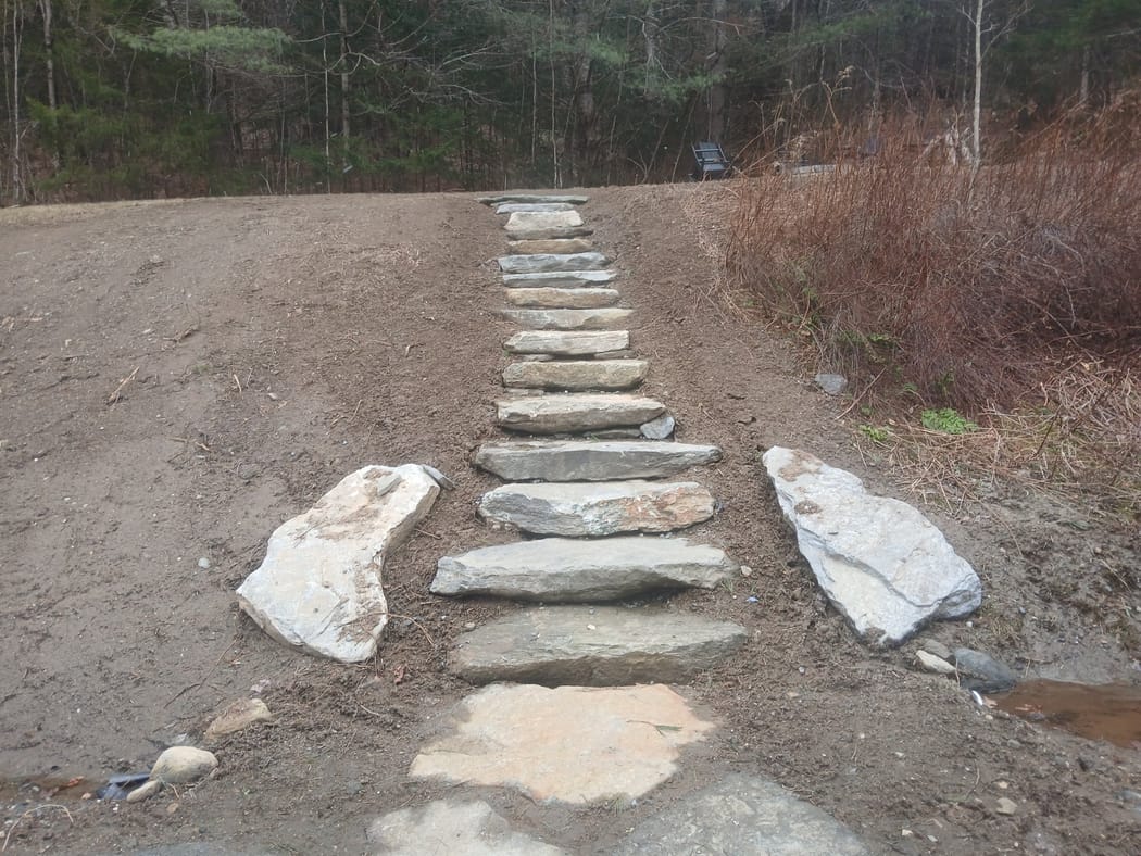 Stone slab steps, set by hand